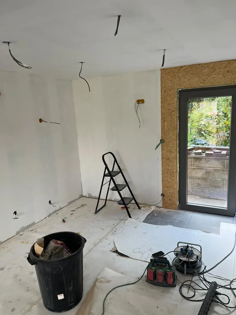 Renovation site with conduits and flush-mount boxes